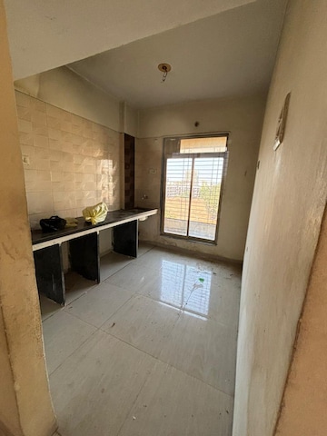 Kitchen in 2 BHK Apartment at Omkar Alta Monte, Malad East – for Rent