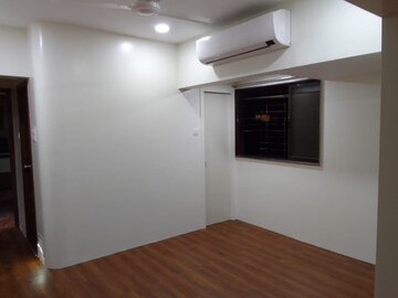 Living Room in 2 BHK Apartment at Andheri West – for Sale