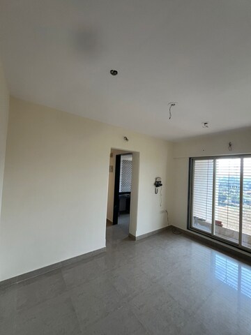 Room in 1 BHK Apartment at Mohan Willows, Badlapur East – for Sale