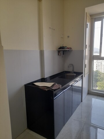 Kitchen in 1 BHK Apartment at Tata Serein, Pokhran Road No 2 – for Rent