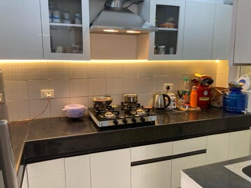 Kitchen in 3 BHK Apartment at Mahagun Mezzaria, Sector 78 – for Rent