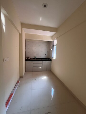 Kitchen in 2 BHK Apartment at Hubtown Greenwoods B Wing, Vartak Nagar – for Rent