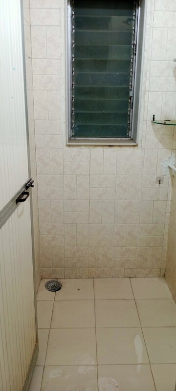 Bathroom in 1 BHK Apartment at Takshila CHS, Andheri East – for Rent