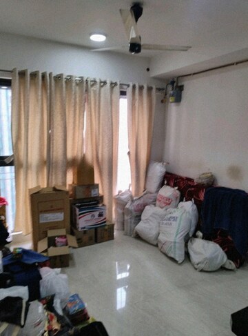 Living Room in 2 BHK Apartment at Lodha Crown Quality Homes, Majiwada – for Rent