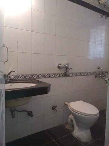 Bathroom in 4 BHK Apartment at Konark Pooram, Kondhwa – for Sale
