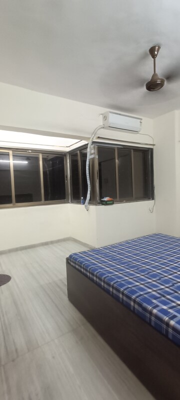 Bedroom in 2 BHK Apartment at Arahant Society, Santacruz East – for Rent