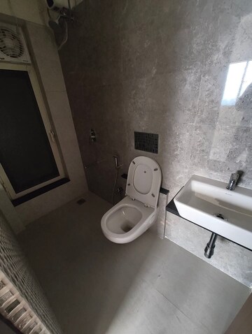 Bathroom in 1 BHK Apartment at Omkar Signet, Malad East – for Rent