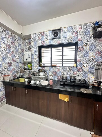 Kitchen in 2 BHK Apartment at Woodland Avenue, Kothrud – for Rent