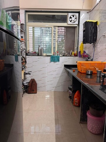 Kitchen in 2 BHK Apartment at Mohan Willows, Badlapur East – for Rent