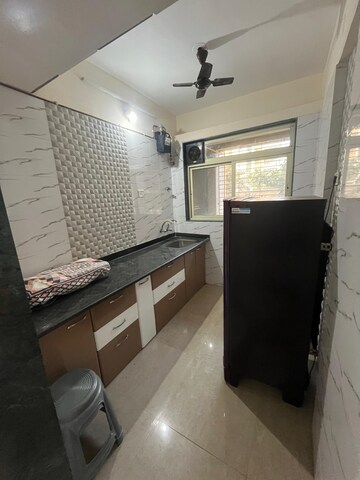 Kitchen in 2 BHK Apartment at Mohan Willows, Badlapur East – for Rent