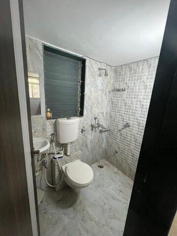Bathroom in 2 BHK Apartment at Mohan Willows, Badlapur East – for Rent