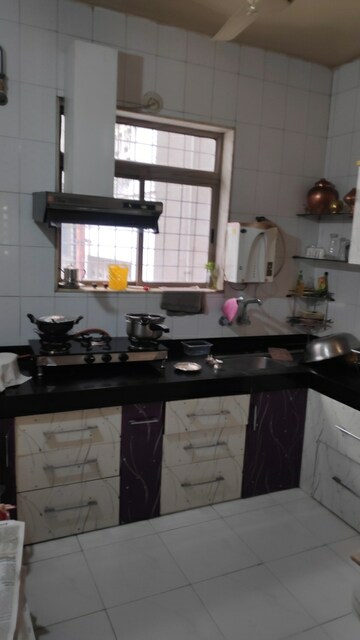 Kitchen in 2 BHK Apartment at Brahma Suncity, Wadgaon Sheri – for Rent