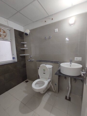 Bathroom in 3 BHK Apartment at International Airport Road – for Rent