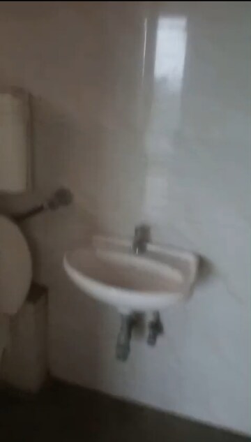 Bathroom in 2 BHK Apartment at Bharat Ecovistas, Shilphata – for Rent