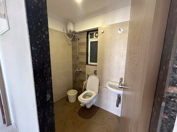 Bathroom in 1 BHK Apartment at Crescent sky Heights, Dahisar East – for Rent