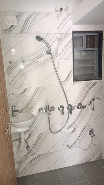 Bathroom in 1 BHK Apartment at Lodha Panacea Phase 2, Dombivli East – for Rent