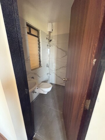 Bathroom in 1 BHK Apartment at Raunak City Sector 4 D4, Kalyan West – for Rent