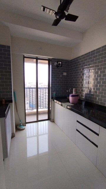 Kitchen in 1 BHK Apartment at Raunak City Sector 4 D4, Kalyan West – for Rent