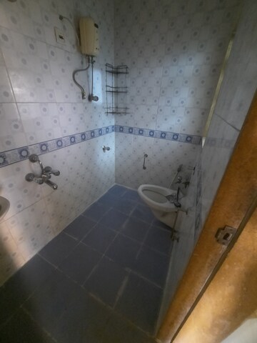 Bathroom in 2 BHK Apartment at Harmony Residency Owale, Owale – for Rent