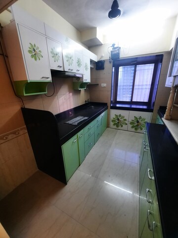 Kitchen in 2 BHK Apartment at Harmony Residency Owale, Owale – for Rent