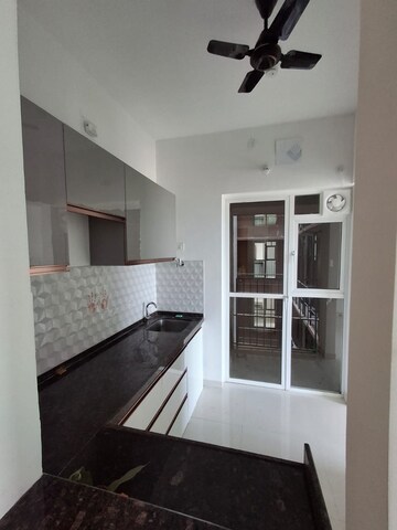 Kitchen in 2 BHK Apartment at Godrej Boulevard, Manjari – for Rent