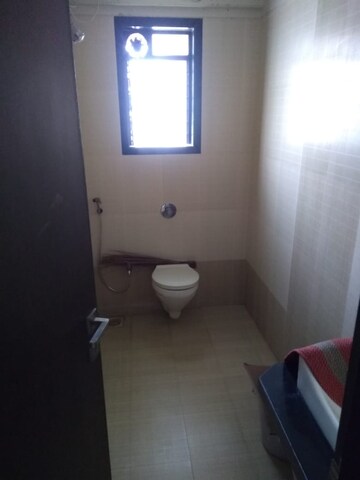 Bathroom in 1 BHK Apartment at Oshiwara Basera CHS, Andheri West – for Rent