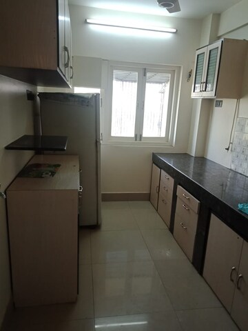 Kitchen in 1 BHK Apartment at Oshiwara Basera CHS, Andheri West – for Rent
