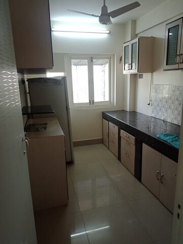 Kitchen in 1 BHK Apartment at Oshiwara Basera CHS, Andheri West – for Rent