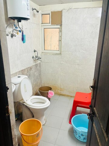 Bathroom in 2 BHK Apartment at Aims Golf City, Sector 75 – for Rent