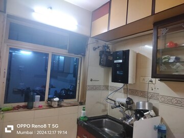 Master Bedroom in 1 BHK Apartment at Galaxy Classique, Goregaon West – for Rent