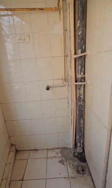 Bathroom in 3 BHK Apartment at Serenity Tower, Andheri West – for Rent
