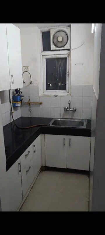 Kitchen in 1 BHK Apartment at Aditya Celebrity Homes, Sector 76 – for Rent