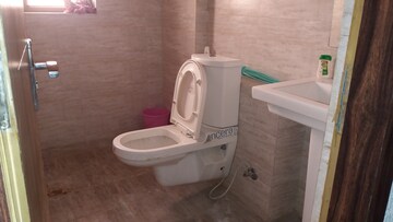 Bathroom in 1 BHK Apartment at Chhatikara – for Sale