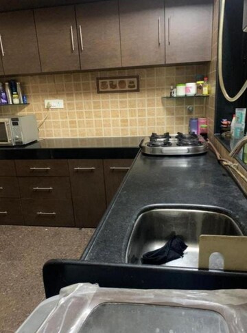 Kitchen in 2 BHK Apartment at Takshila CHS, Andheri East – for Rent