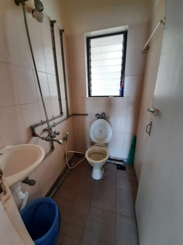 Bathroom in 1 BHK Apartment at Vasant Valley Complex, Malad East – for Rent