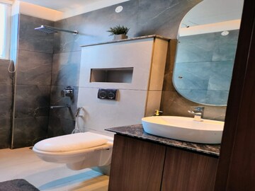 Bathroom in 3 BHK Apartment at Dhakoli Village – for Sale