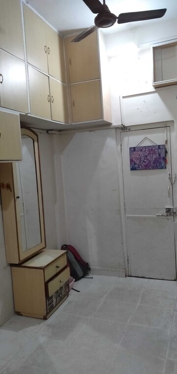 Room in 2 BHK Apartment at New Kamal Kunj CHS, Malad East – for Sale