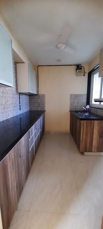 Kitchen in 2 BHK Apartment at Lokhandwala Complex, Andheri West – for Sale