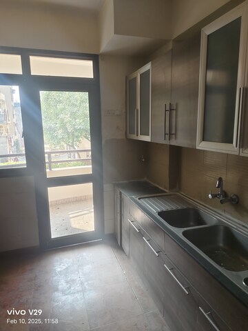 Kitchen in 3 BHK Apartment at Dhoot Time Residency, Sector 63 – for Sale