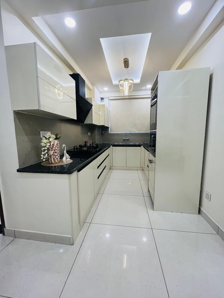 Kitchen, the-suman-marvelous 3 Bedroom 1745 Sq.Ft. Apartment In Ramgarh Bhudda Zirakpur 8187121