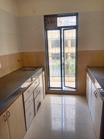 Kitchen in 1 BHK Apartment at Realtech Heights, Vasai – for Sale