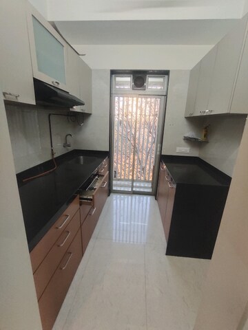 Kitchen in 2 BHK Apartment at Haware Tilak Nagar, Tilak Nagar – for Rent