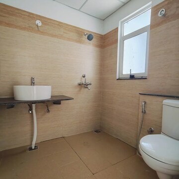 Bathroom in 3 BHK Apartment at Sushma Valencia, Nagla Road – for Rent