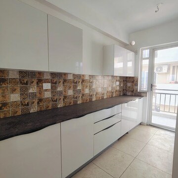 Kitchen in 3 BHK Apartment at Sushma Valencia, Nagla Road – for Rent