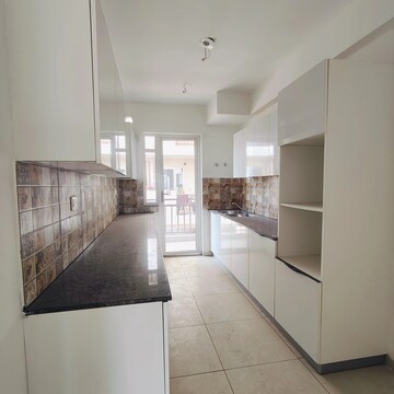 Kitchen in 3 BHK Apartment at Sushma Valencia, Nagla Road – for Rent