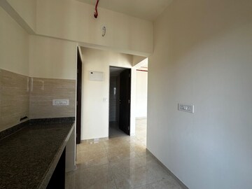 Kitchen in 1 BHK Apartment at Sunteck Maxxworld 2, Naigaon East – for Rent