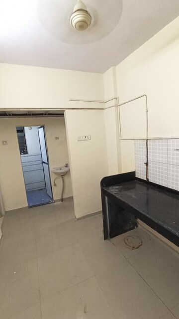 Kitchen in 1 BHK Apartment at Royal Palms, Goregaon East – for Rent