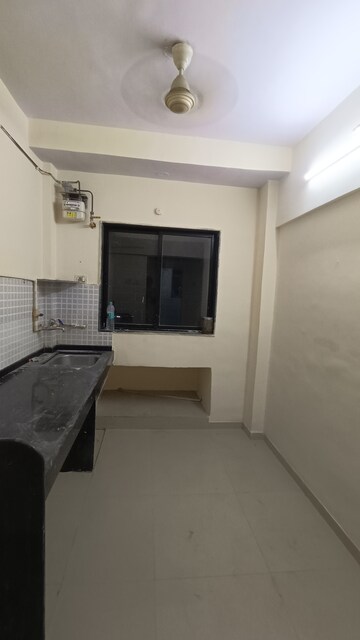 Kitchen in 1 BHK Apartment at Royal Palms, Goregaon East – for Rent