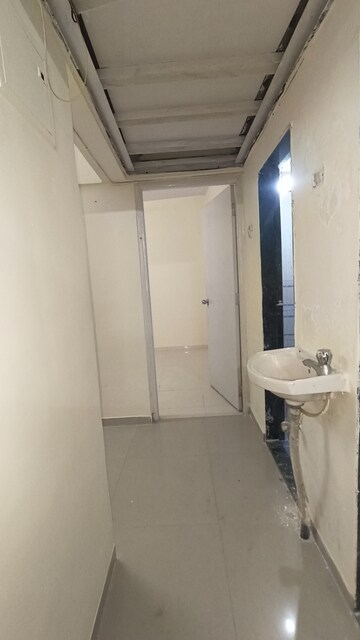 Building Lobby in 1 BHK Apartment at Royal Palms, Goregaon East – for Rent