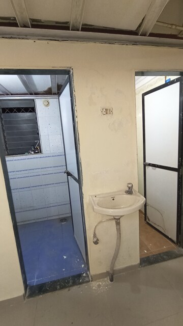 Bathroom in 1 BHK Apartment at Royal Palms, Goregaon East – for Rent